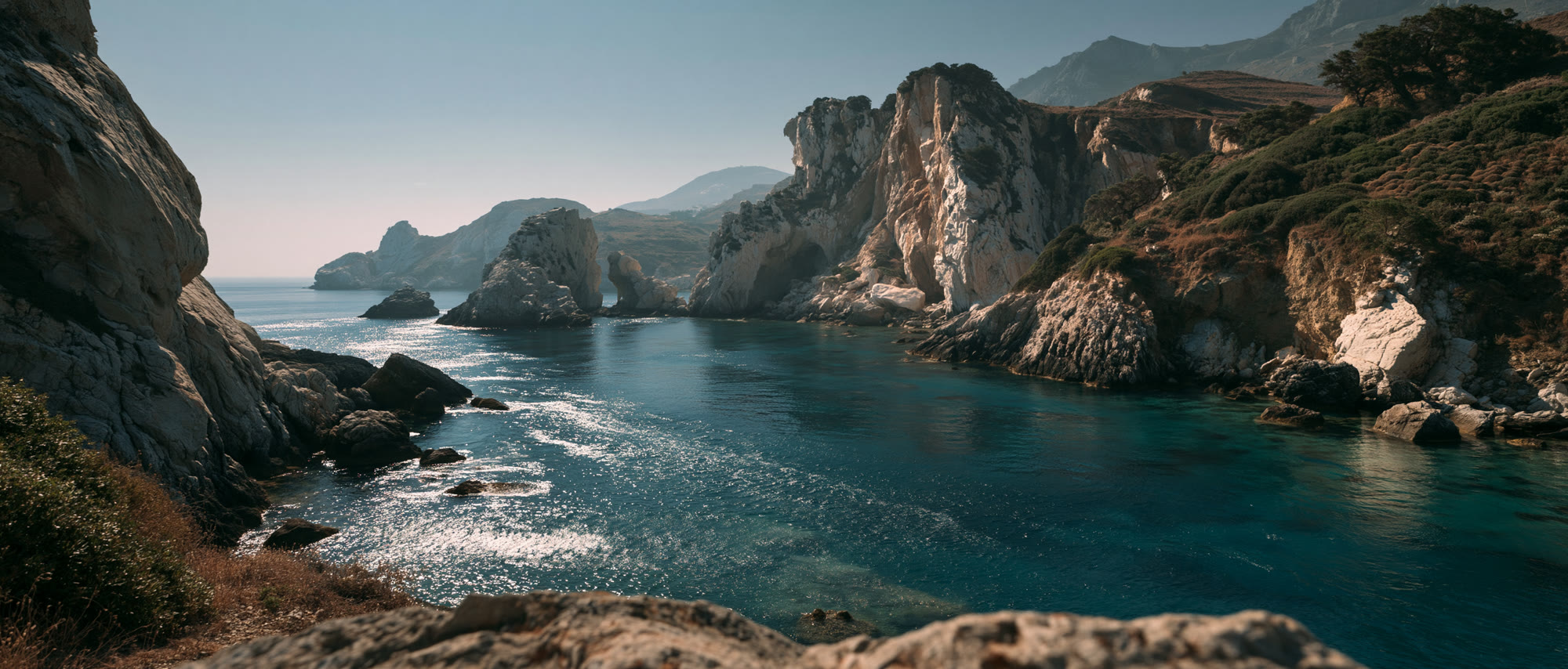 A sparkling blue cove at the edge of the hidden world